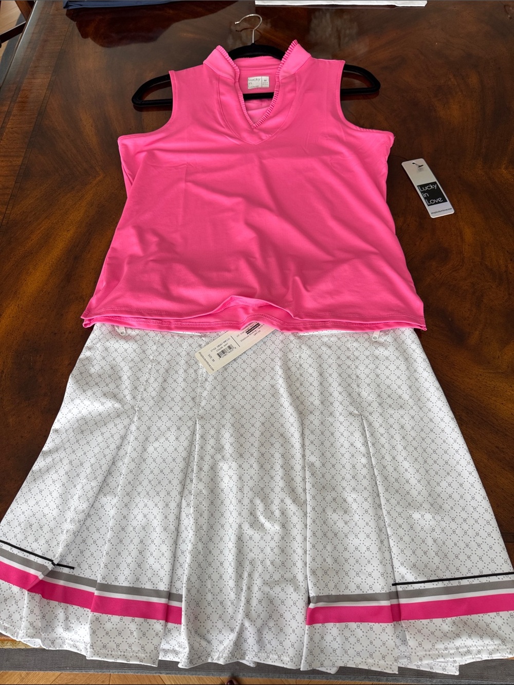 Lucky in Love Pink Sleeveless Golf Top with White Pleated Skirt